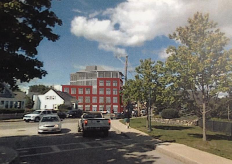 Rendered view of hotel looking north on Main Street.