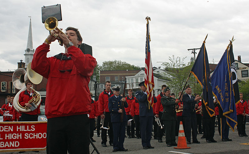 During the 9 a.m. Memorial Day service at the Camden Public Landing, Chandler Crans plays taps, while Aaron Nolan (not shown) plays in echo in the background. (Photo by Holly S. Edwards)