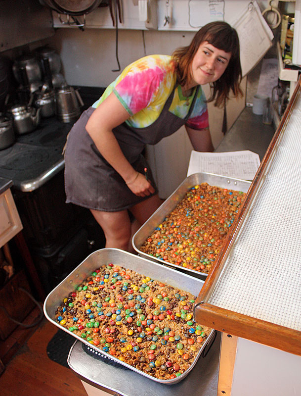 Three meals each day, with a different dessert after each lunch and dinner course, were created and/or prepared by the Mary Day’s cook, Cari Baumgertner. She sleeps in a tiny berth behind her in the photo, and is up every morning at 4 a.m. (Photo by Holly S. Edwards)