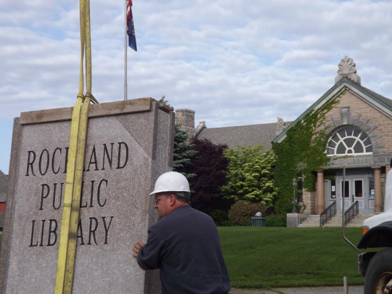 Prock Marine was one of several local companies that donated goods and services to the Friends of Rockland Public Library for a new granite sign. (Photo by TimO)