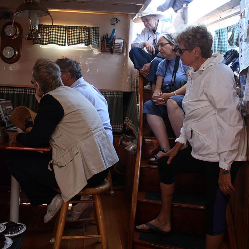 Passengers spent the week taking photos, and then Friday professional photographer Jim Dugan viewed all of the photos in preparation for a slide show of the student’s best works. (Photo by Holly S. Edwards)