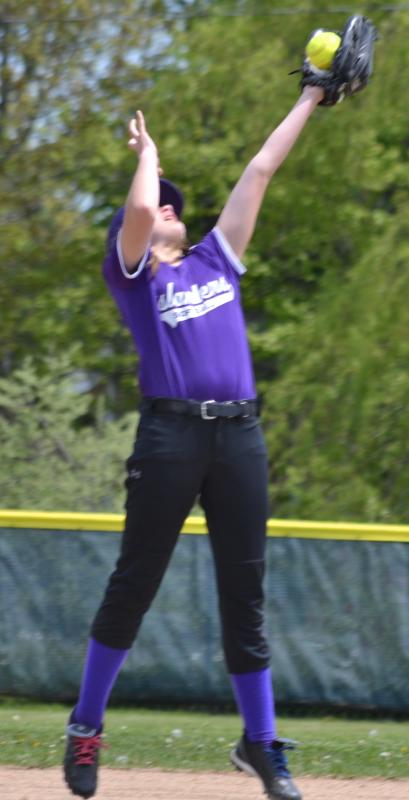 Islanders shortstop Lily Warren leaps to get the ball. (Photo by George Harvey)