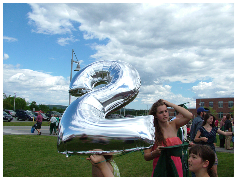 A mylar “2” from one of several “2014” balloon arrangements decorating the gym during the graduation ceremony.