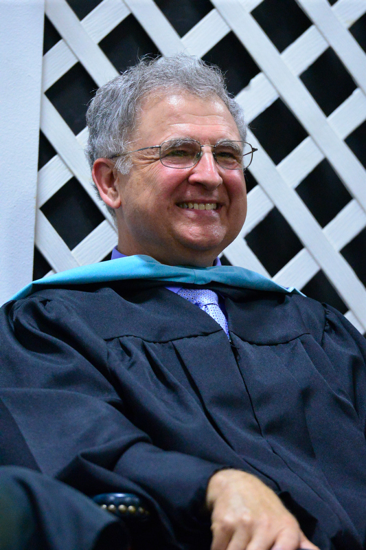 Principal Harold E. Wilson was all smiles most of the evening. (Photo by Ron Hawkes)