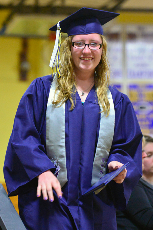 Testa Marie Luce is all smiles after receiving her diploma. (Photo by Ron Hawkes)