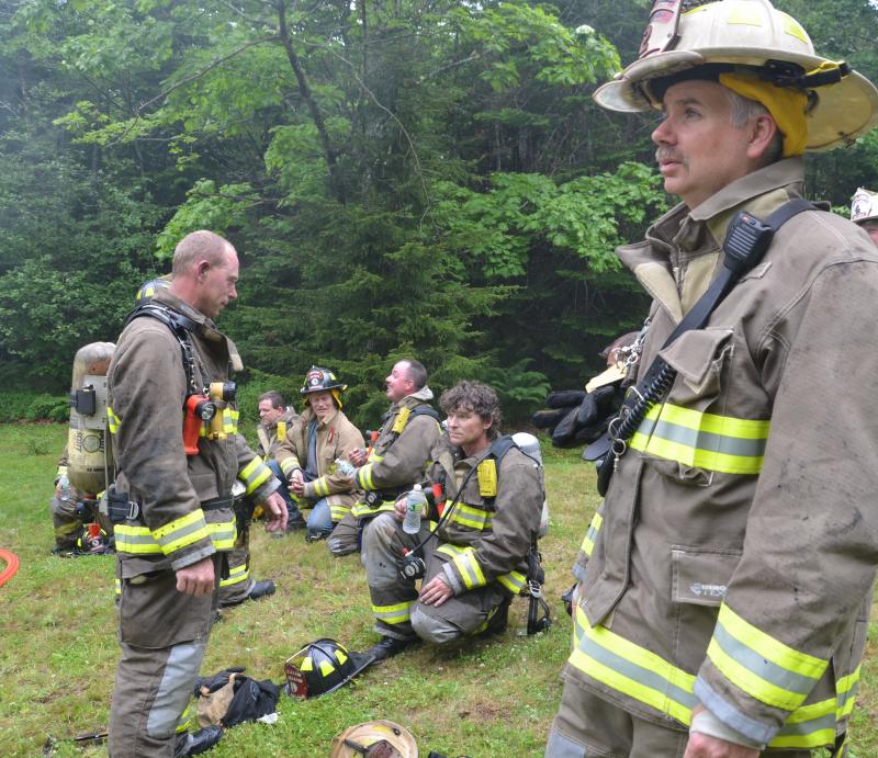 Taking a rest from fighting the fire. (Photo by Lynda Clancy)