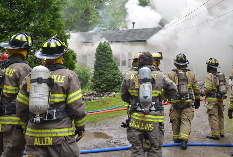 Camden, Lincolnville and Rockport fire departments converged at a house fire this morning, June 14, on Shermans Point Road while Hope and Union firefighters covered the Camden station in the event another incident occurred. (Photo by Lynda Clancy)