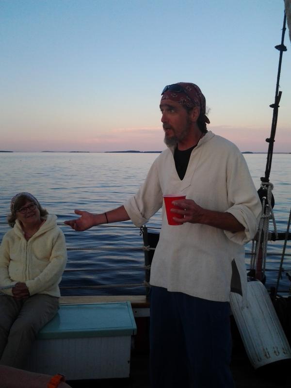 Pirate John reciting John Masefield’s Sea Fever for the Appledore crowd on the sunset sail. (Photo by Kay Stephens)