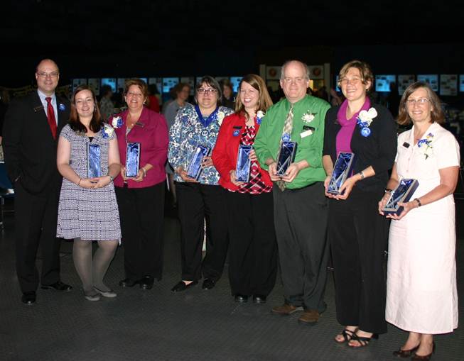 Greg Dufour, president and chief executive officer of Camden National Bank, congratulates award winners at this year’s Stakeholder Appreciation Event held on June 18 at the Augusta Civic Center. Pictured left to right: Dufour, Penny Johnson, Tena Wallace, Cindy Dines, Angie Snow, Danny Jackson, Betsy Maguire and Susan Van Allen.