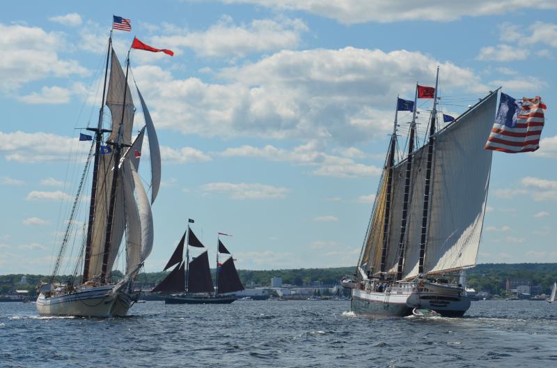 Local schooners Heritage, Angelique and Victory Chimes parade through Rockland Harbor on a perfect day for sailing, July 11. (Photo by Lynda Clancy)