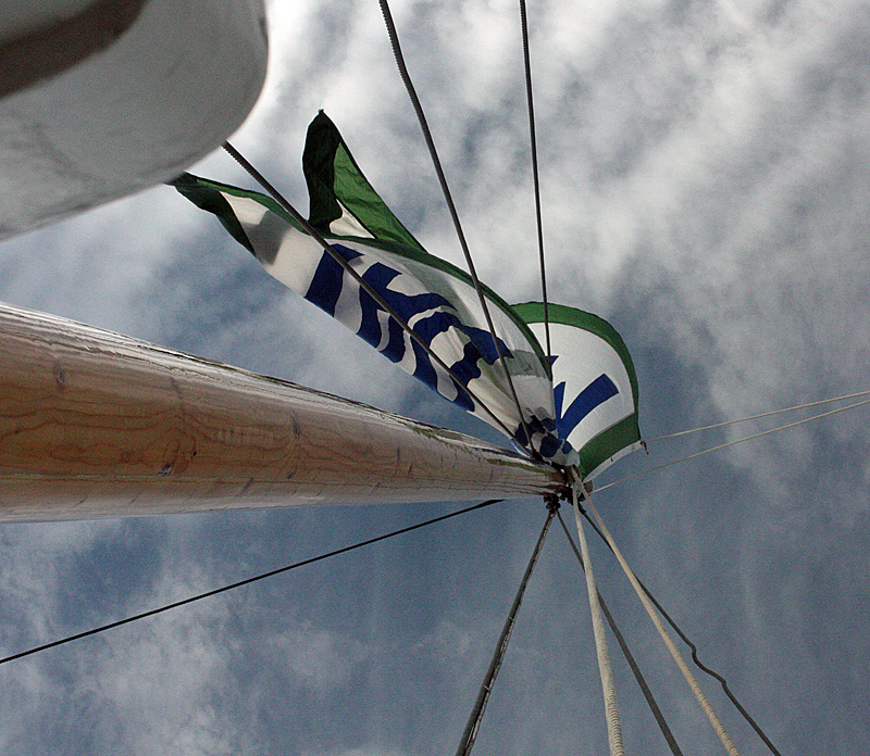 As we climbed aloft, the Mary Day’s flag followed us up to its position on the top mast. (Photo by Holly S. Edwards)