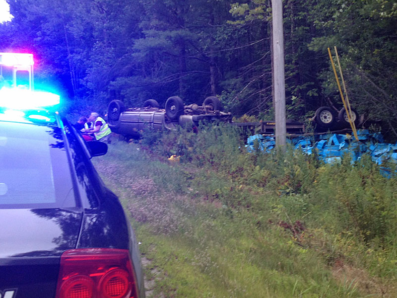 The truck was towing a trailer loaded with totes of wild Maine blueberries, valued at around $700. (Photo by David Edwards)