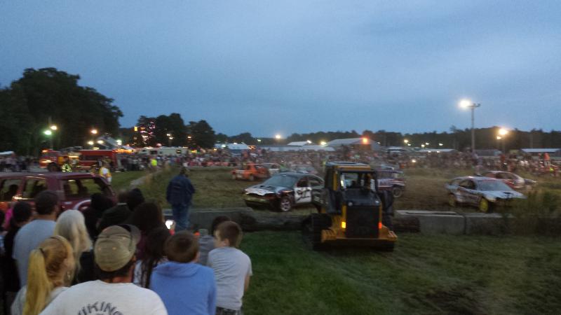 Spectators watch the Demolition Derby by the fields. (Photo courtesy Jaden Eaton)
