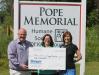 PMHSKC Executive Director Tracy Sala (center) accepts a $1,000 donation check from Bangor
Savings Bank representatives Mark Foster and Mary Bumiller.