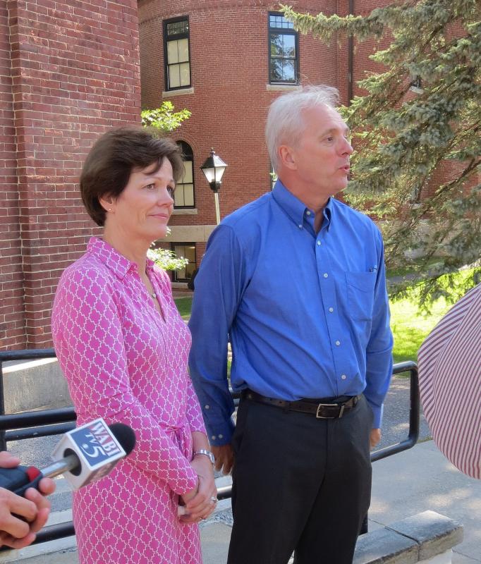 Sheila and Greg Johnson speak with reporters following sentencing. (photo by Erica Thoms)
