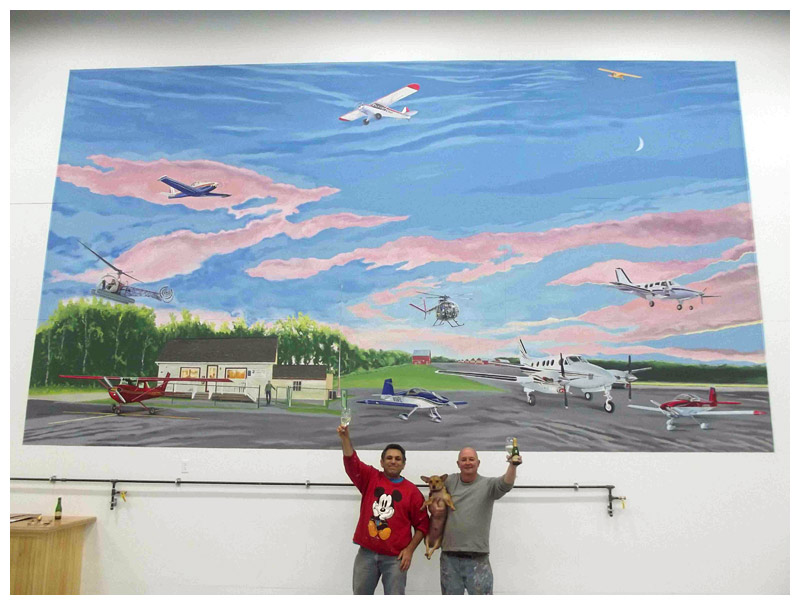 Hurley, right, and Russell Kahn in front of the finished mural. (Photo courtesy of David Hurley)
