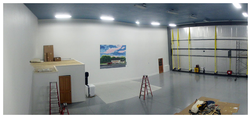 A wide view of the airplane hangar showing the first of four phases of the mural. (Photo courtesy of David Hurley)
