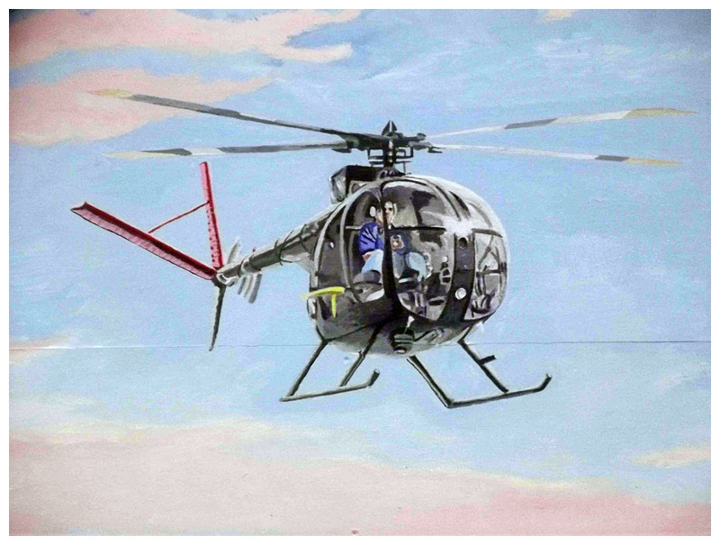 One of two helicopters included in the mural. Hurley said photos of the aircraft were projected onto the wall initially, but getting the correct perspective and size was still a challenge. (Photo courtesy of David Hurley)
