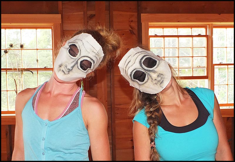 Shana Bloomstein and Kristi Williamson are the faces behind the masks in a moving number.
