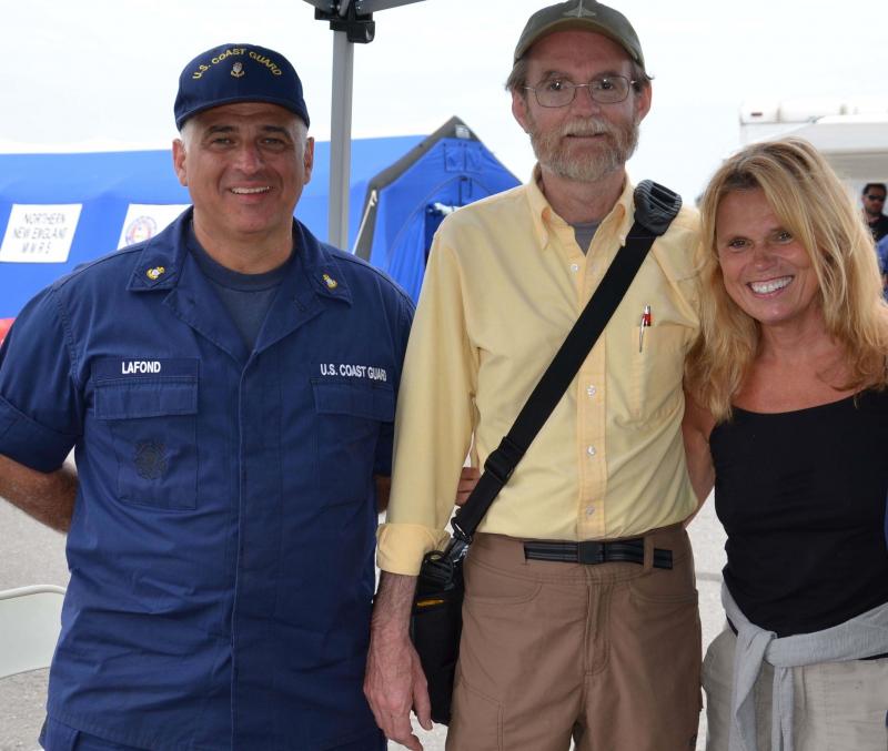 Rockland Mayor Pritchett joins Maritime Enforcement Chief Michael Lafond and Julianne Waesche on the Coast Guard pier in Rockland Harbor Aug. 3. (Photo by Lynda Clancy)