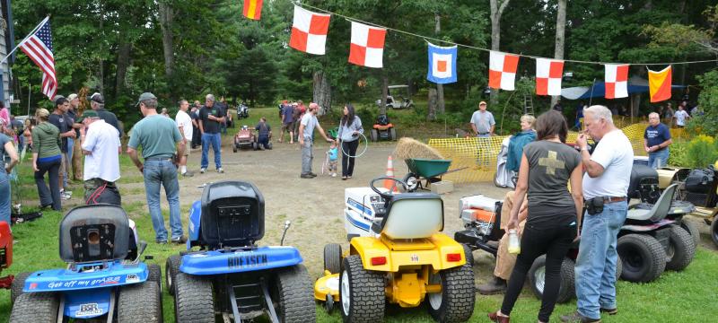 The third annual Lincolnville Lawnmower Races were held Sunday, Aug. 17, before a crowd of enthusiastic fans. (Photo by Lynda Clancy)