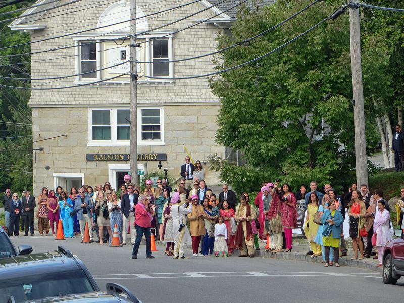 The bride’s family and friends await Johann, the groom, on the other end of Central Street, at the edge of Goodridge Park. (Photo by Richard Anderson)