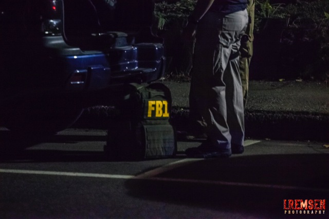 An FBI agent arrives on the scene and prepares to get to work. (Courtesy Isaac Remsen)