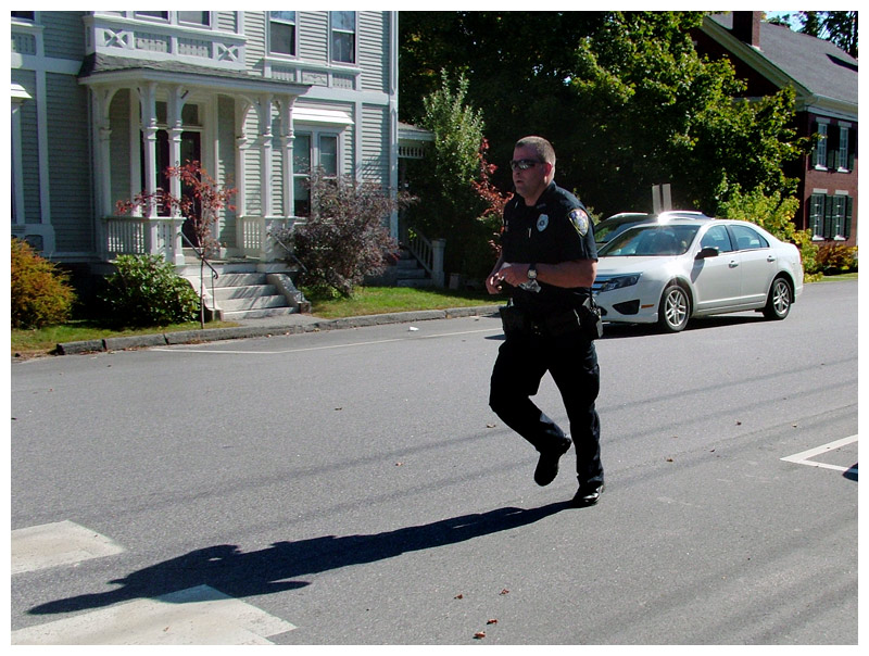 Belfast Police Officer Rick Smith ran the 5K in full uniform, including boots, a bulletproof vest, and guns to show support for WeCARE. (Photo by Ethan Andrews)