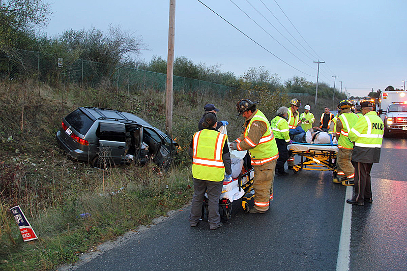 Jane Tarbox was driving this Honda van Tuesday morning when she reportedly drifted off the road, over-corrected, crossed the other lane of traffic and crashed head-on into a utility pole at the entrance to Dragon Cement in Thomaston. (Courtesy Rockland Fire Department/by Alan Athearn)