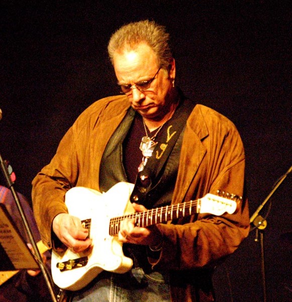 Blind Albert and friends play a blues jam at The Highlands Coffee House on Friday night.