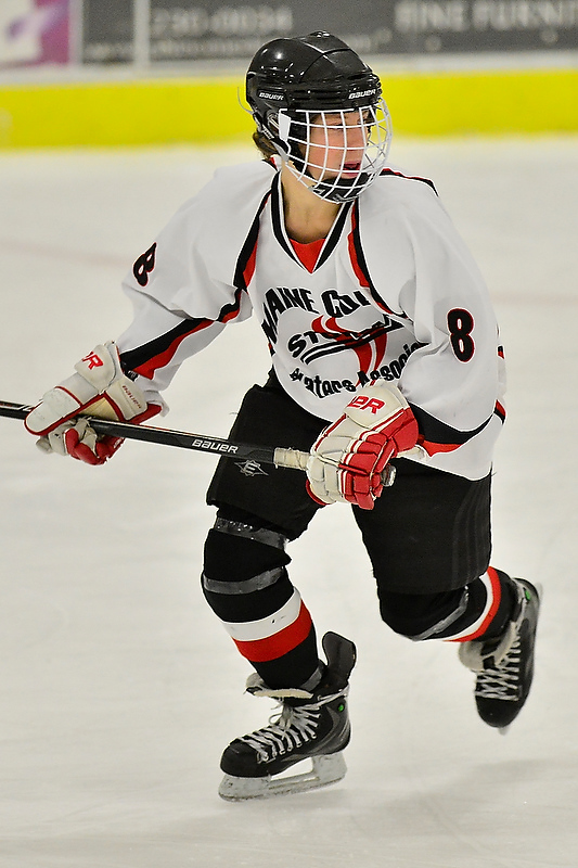 The Storm’s Cameron Christie looks to receive the pass as he skates up the ice. Christie scored the first goal for the Storm. (Photo by Ron Hawkes)