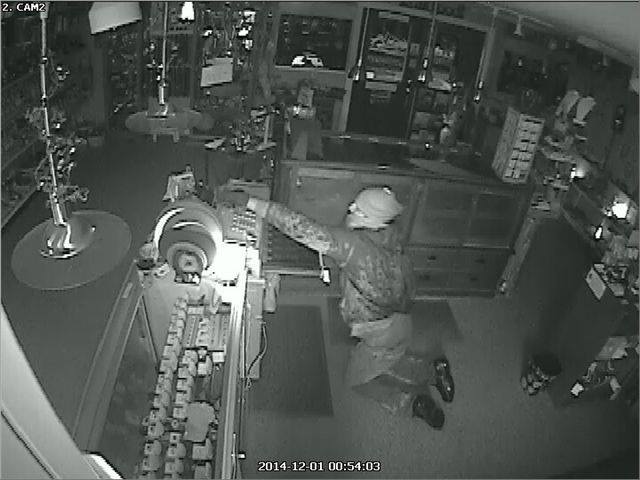 A surveillance video image of a burglar inside Bennett’s Gems & Jewelry, early Monday morning. (Photo courtesy of Belfast Police Department)
