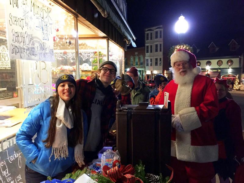 Members of the Interact Club selling wreaths at Christmas By The Sea to raise money for their holiday projects. (Photo courtesy Karen Hansen)