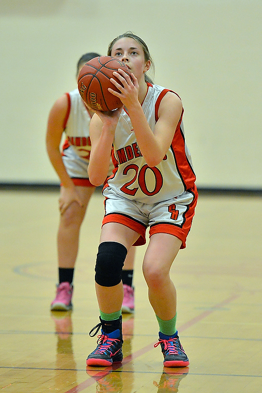 Camden Hills' Audrey Clement looks focused as she shoots a foul shot. (Photo by Ron Hawkes)