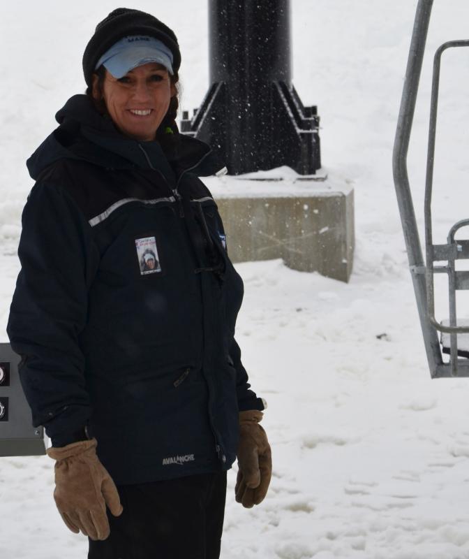 Richelle Gagne, helping skiers negotiate the new lift. (Photo by Lynda Clancy)