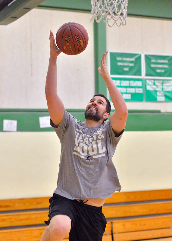 Appleton Village School Coach Jared Todd likes to get right in the mix and work with his players. With only seven he needs to do that from time to time. (Photo by Ron Hawkes)