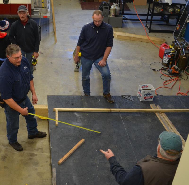Phil Brown, Michael Callaway, John Wickenden and Allen Mitchell get the framing underway. (Photo by Lynda Clancy)