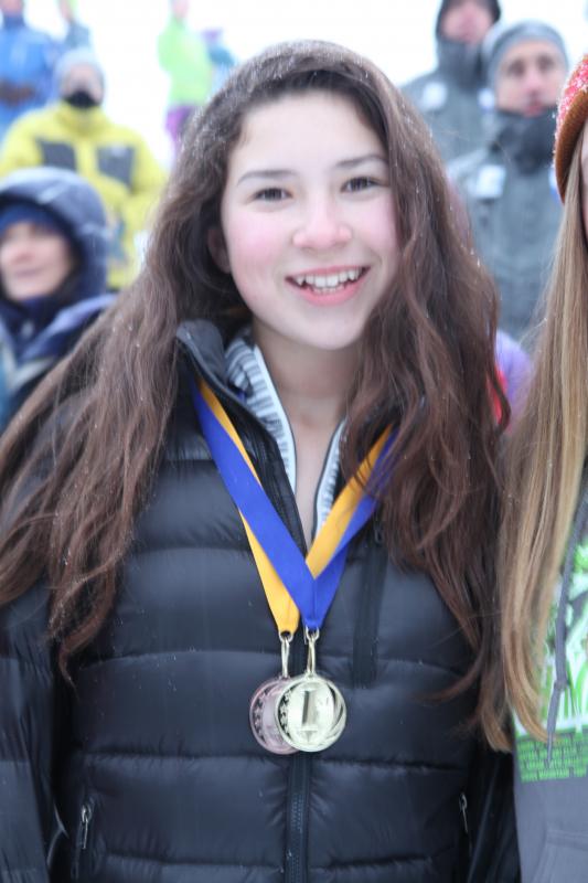 Vika Santoro and her awards for slalom (third) and giant slalom (first). (Courtesy Lori Traikos)