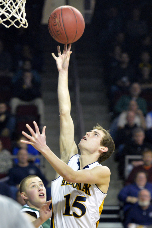 Medomak’s Micah Williamson with a finger roll layup for two points in Wednesday’s game. Medomak Valley defeated MDI 59-47. (Photo by Ron Hawkes)