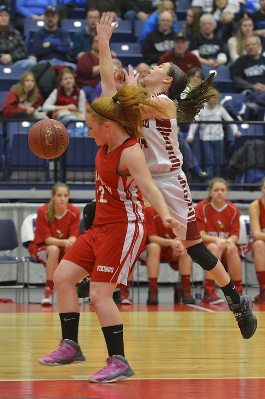 Vinalhaven’s Ashley Davis-Oakes breaks up a layup early in the game. (Photo by Ron Hawkes)