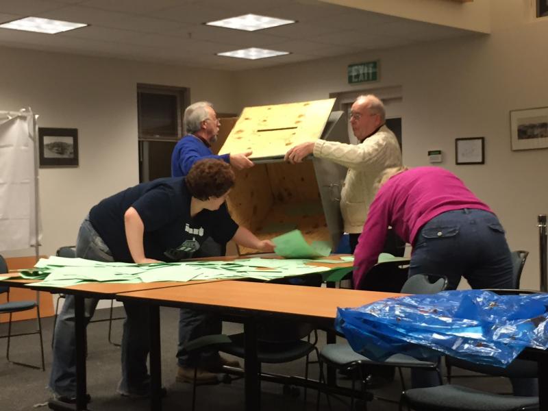 Heaven Bartlett, Walter Greenlaw, Herbert Annis and Marieta Wheaton get the ballots on the table to count just after 8 p.m. (Photo by Lynda Clancy)