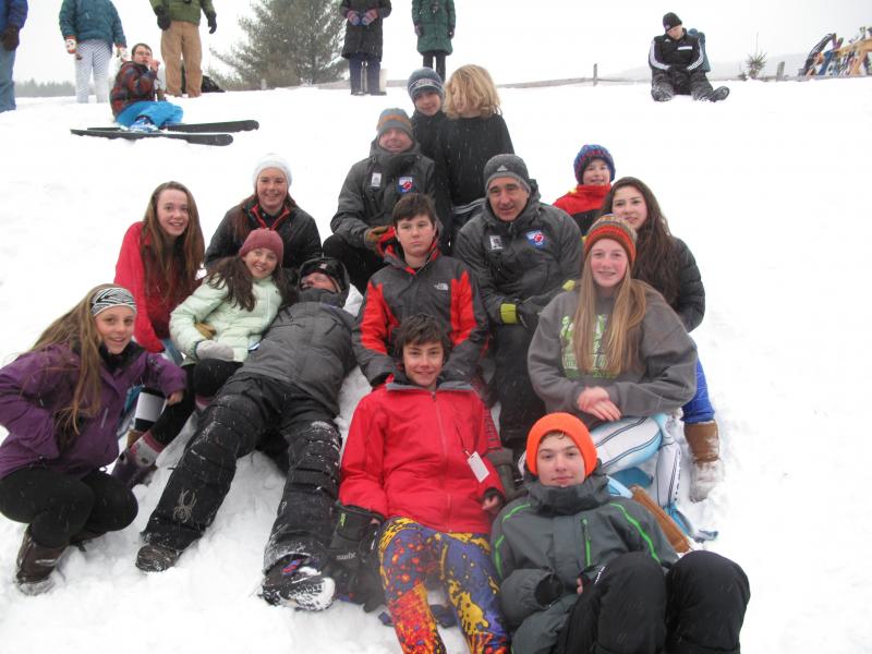 The Camden Snow Bowl middle school ski teams and their coaches at the state championships. (Courtesy Lori Traikos)