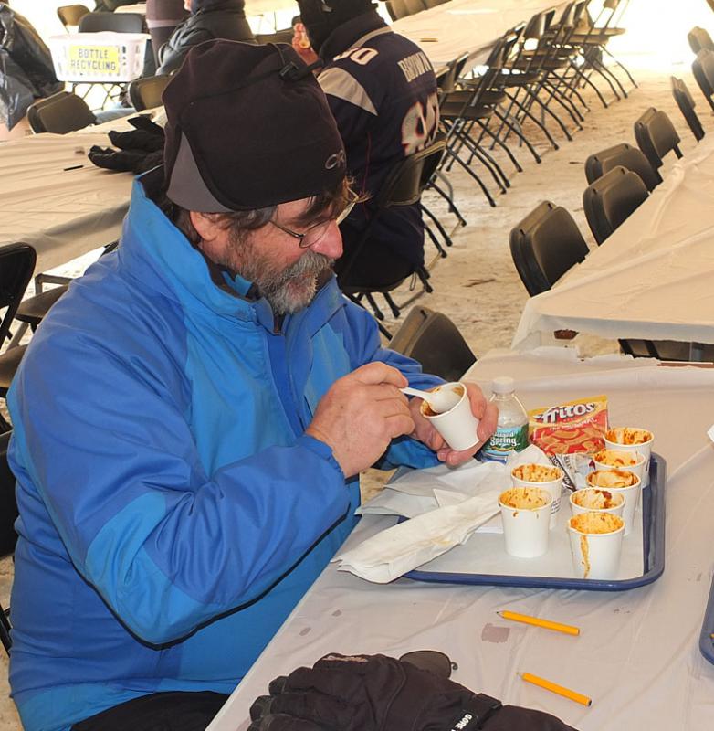 Alan Frizzell of Stratford, N.H. samples chili during West Bay Rotary Club’s Chili Challenge Saturday. #toboggannationals