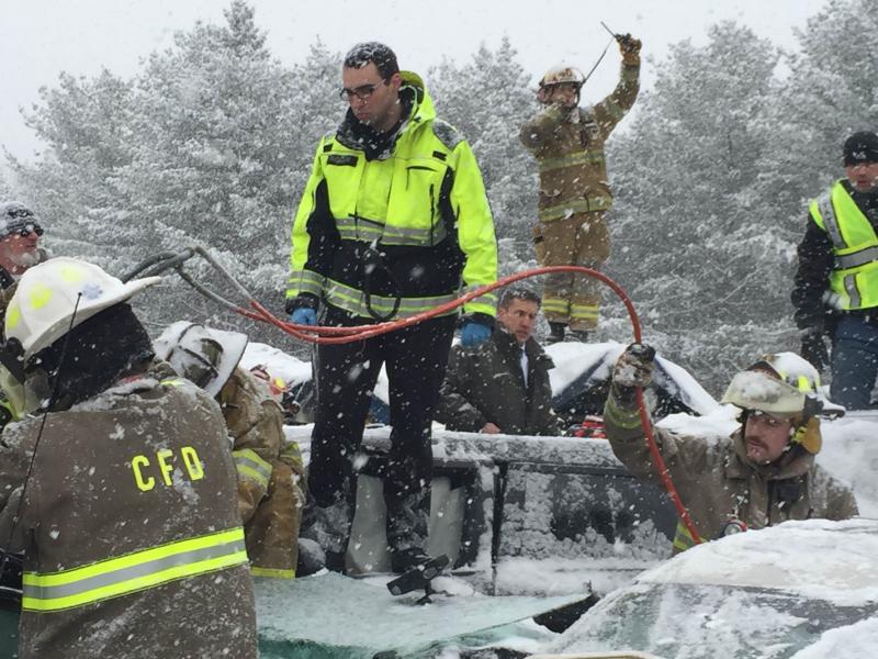 Hermon Fire Capt. Chandler Corriveau helps direct firefighters, troopers and other first responders to check on the many motorists still inside their wrecked vehicles following Wednesday morning’s 75-car pile-up on I95 in Etna and Hermon. (Courtesy Maine Dept. of Public Safety)