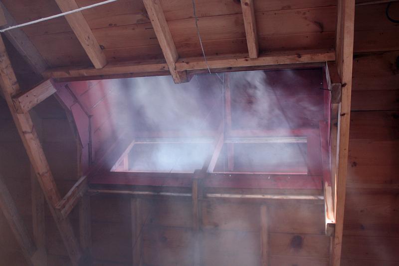 Steam, cast off during the sugar maple sap boiling process to make maple syrup, flows up and out of the top of Tom Cox’s sugarhouse in Rockport March 18. (Photo by Holly S. Edwards)