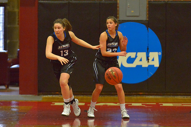 UNE’s Alanna Vose, right, and MWBCA All-State first team selection senior Kelly Coleman. (Photo by Ron Hawkes)