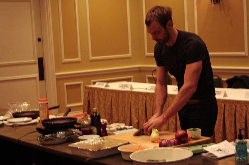Seaver prepares his dishes in front of an audience, explaining his philosophy and process. (Photo by Kay Stephens)