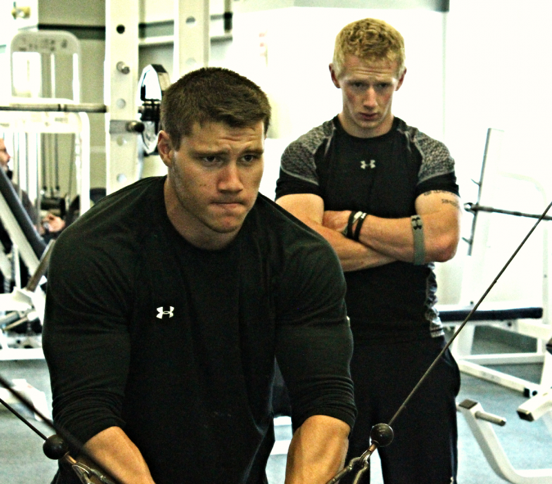 Jacob Powers, another former Windjammer, trains hard with Jack Hauprich, back, of CJ Fitness. (Courtesy of Chris Chacon)
