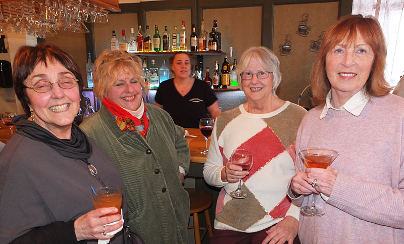 Janet Bosworth, Diane Giese, Nancy Burton and Karen Clarke enjoy the evening to support a good cause.