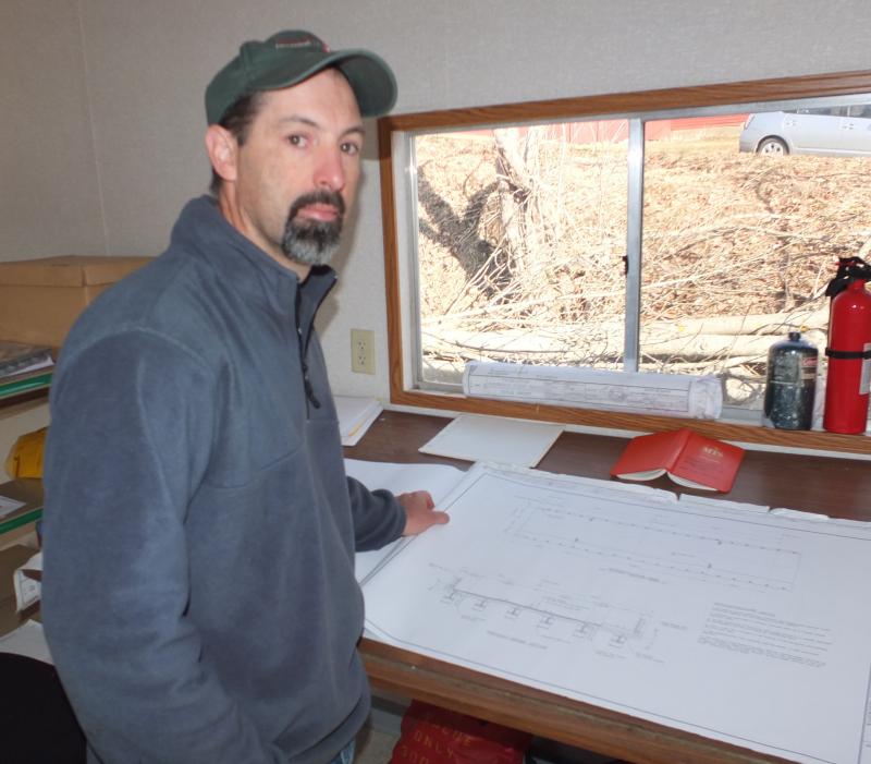 Guy Hews, resident engineer for the state of Maine, at work. (Photo by Chris Wolf)